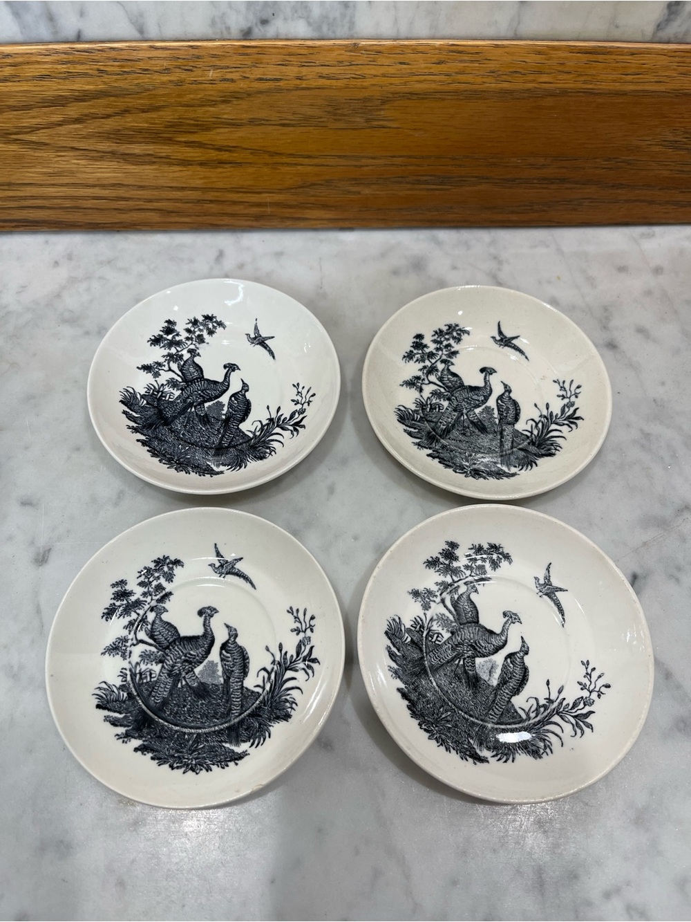 4 Wedgwood "Liverpool Birds" black transferware saucers